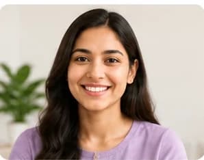Sneha Ma'am, smiling at the camera
